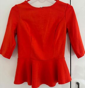 Vibrant Orange Peplum Top