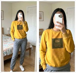 yellow sweatshirt