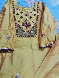 Elegant Yellow Kurta Set with Intricate Embroidery