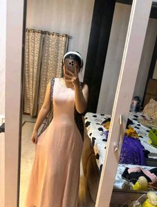 Elegant Peach Gown with Black Lace Detail