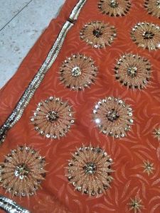 orange heavy work saree (one time used only)