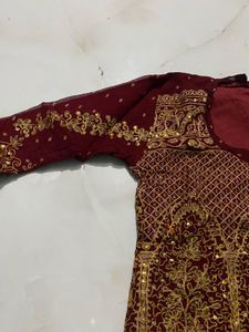 Exquisite Maroon &amp; Gold Embellished Lehenga Choli
