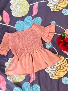 Smocked Peplum Top