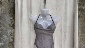 68.. Grey Embellished Halter Top