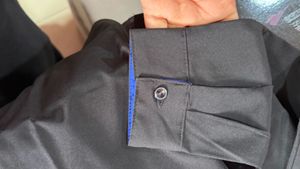 Black Button-Up Shirt with Blue Trim bust