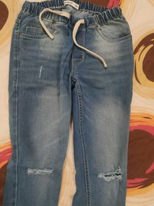 Distressed Denim Jogger Jeans