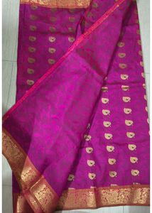 Vibrant Pink Saree with Gold Motifs