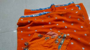 Orange Saree with Star Motifs and Blouse