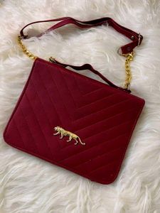 sabhyasachi Red Handbag with Gold Tiger Accent