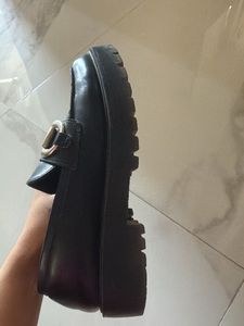 Classic Black Loafers with Gold Buckle