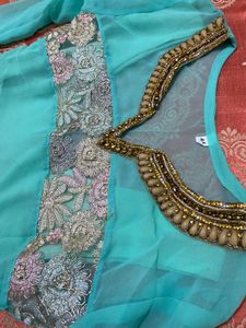 Elegant Teal Kurta Set with Intricate Embroidery