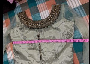 Elegant PistaGreen Anarkali with Embellished Neck