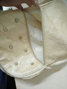 Quilted Backpack with Embellishments