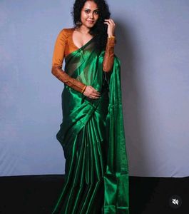 Elegant Emerald Green raga tissue Saree