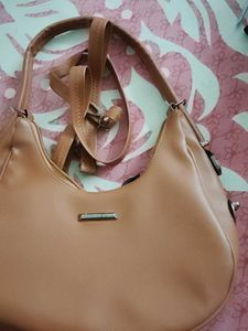 97.Stylish Tan Hobo Bag