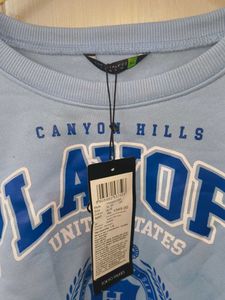 Light Blue "Playoff" Graphic Sweatshirt