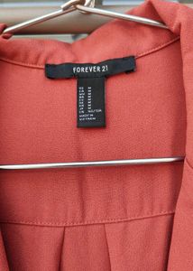 Chic Pink Romper with Black Trim