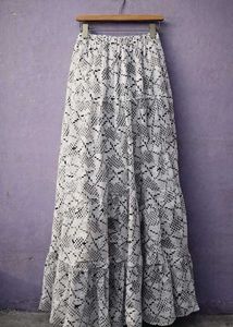 Long white skirt with black Polka dot