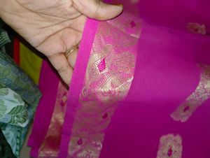 Vibrant Pink Saree with Gold Motifs