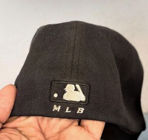Black Baseball Cap with 'D' Logo