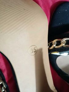 Chic Black Heels with Gold Chain Detail