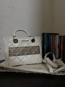 Chic White Quilted Handbag with Embellishments