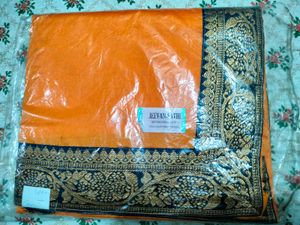 Orange Saree with Embroidered Border