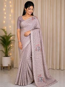 Elegant Beige Saree with Intricate Pattern