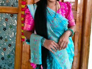 pink blouse blue saree