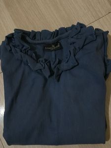 Chic Sleeveless Top with Ruffle Neckline