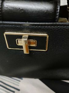 Chic Black Handbag with Scrunchie Handle