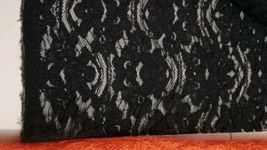 Elegant black, orange, cream net fabric