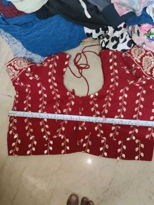 Elegant Maroon Embroidered Saree