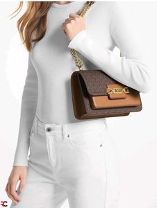 MICHAEL KORS**SIGNATURE LOGO PRINT HEATHER BAG*