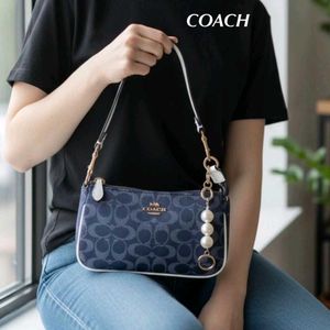COACH NOLITA DAISY APPLIQUE BAG, FEATURE WITH A PE