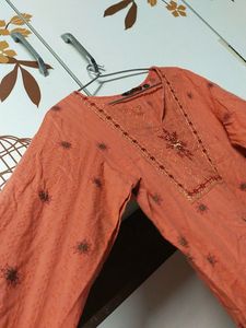 Orange kurti , breast size 38 , waist 34 , hips 38