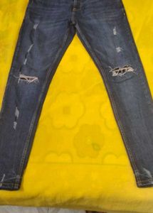 Distressed Blue Denim Jeans