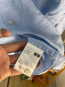Uniqlo Light Blue Button-Up Shirt