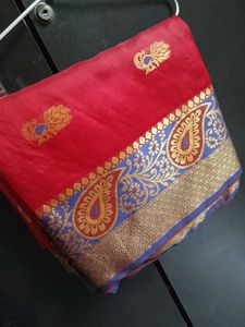 Vibrant Red Silk Saree with Peacock Motifs