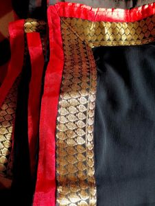 Elegant Black Saree with Gold &amp; Pink Border
