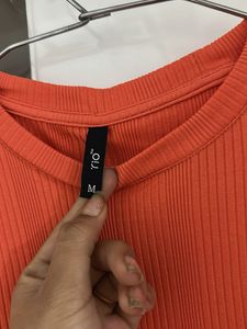 Orange Ribbed body con Dress