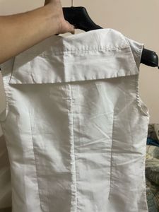Classic White Sleeveless Button-Up Top