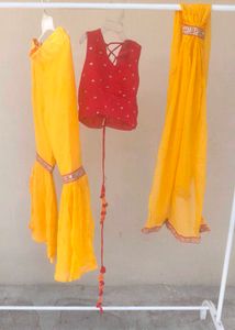 Vibrant Yellow Flared sharara and red choli duppat