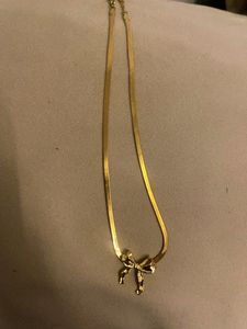 anti tarnished Gold Tone Bow Necklace