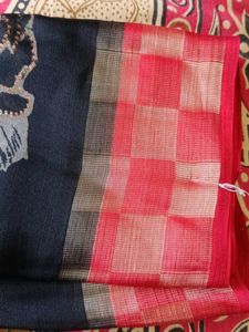 black golden and red colour saree