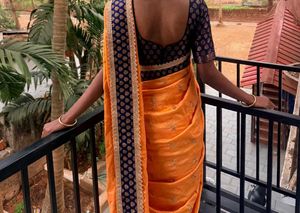 Elegant Orange Saree with Navy Blue Blouse