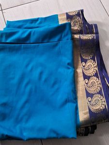 Elegant Teal Saree with Paisley Border