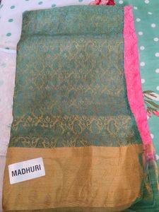 Elegant Teal Saree with Gold Border