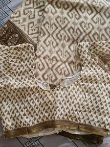 Elegant Cream and Brown Saree
