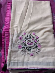 Elegant Cream Saree with Pink Floral Embroidery